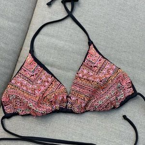 Embroidery and beads on this cute swim top